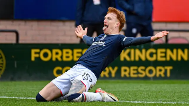 Simon Murray celebrates