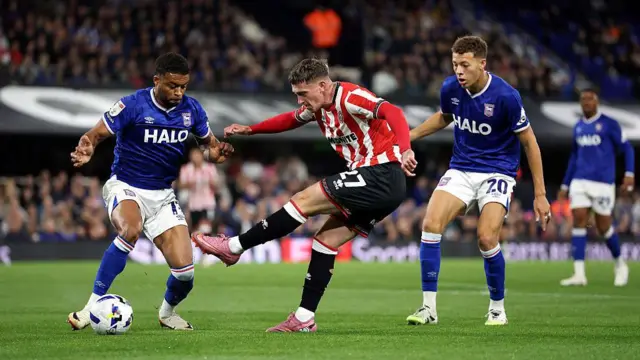 Louie Barry takes a shot during a match for Sheffield United