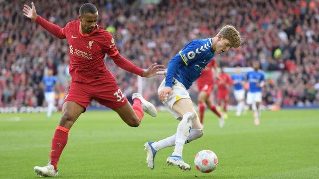 Joel Matip trying to dispossess Anthony Gordon