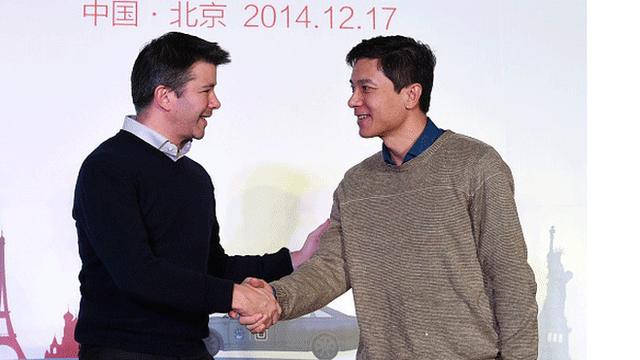 Uber chief executive shakes hands with Baidu chairman