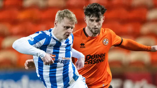 Kilmarnock's Gary MacKay-Steven and Dundee United's Will Ferry