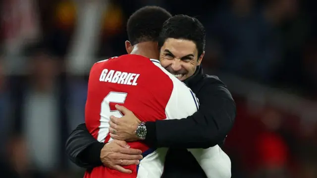 Arsenal boss Mikel Arteta embraces defender Gabriel