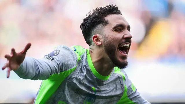 Rayan Cherki celebrates