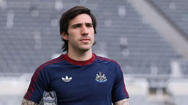 Sandro Tonali looks on before match for Newcastle