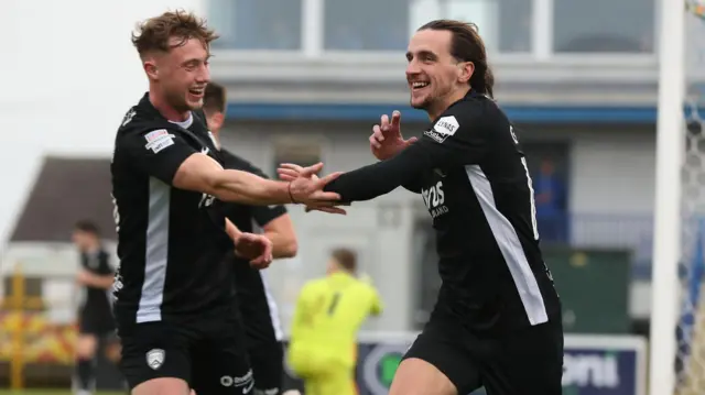 Matthew Shevlin and Jamie Glackin celebrate