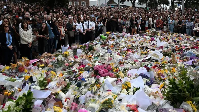 Tributes are laid near Bondi Beach after at least 15 people were killed in a shooting on Sunday