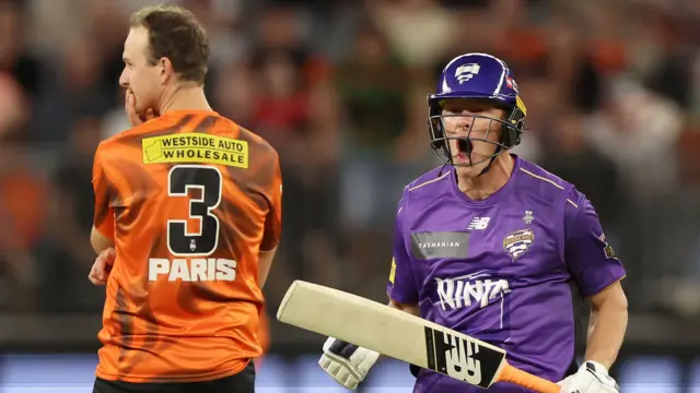 Nathan Ellis of the Hurricanes celebrates the win during the BBL match between Perth Scorchers and Hobart Hurricanes at Optus Stadium