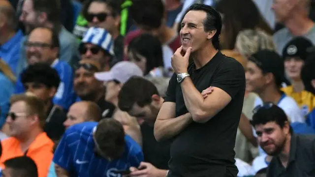 Aston Villa's Spanish manager Unai Emery reacts during the English Premier League football match between Brighton and Hove Albion and Aston Villa at the American Express Community Stadium in Brighton, southern England on August 23, 2026.