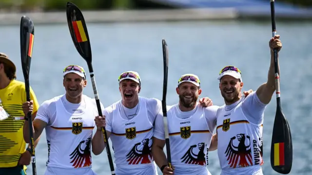 Gold medalists Max Rendschmidt, Max Lemke, Jacob Schopf and Tom Liebscher-Lucz of Germany celebreate after the Men's Kayak Four 500m Final