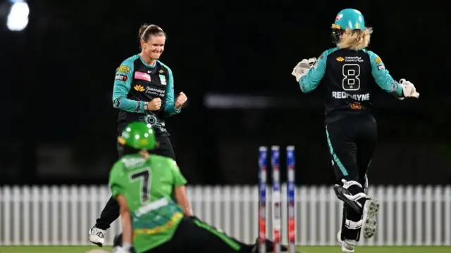 Jess Jonassen for Brisbane Heat, celebrates the wicket of Meg Lanning of Melbourne Stars