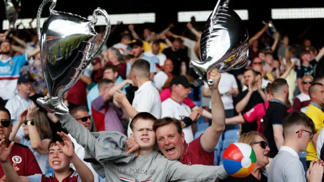 Aston Villa fans with Champions League inflatables