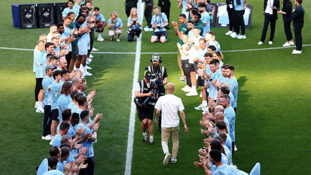 Pep Guardiola receives a guard of honour 