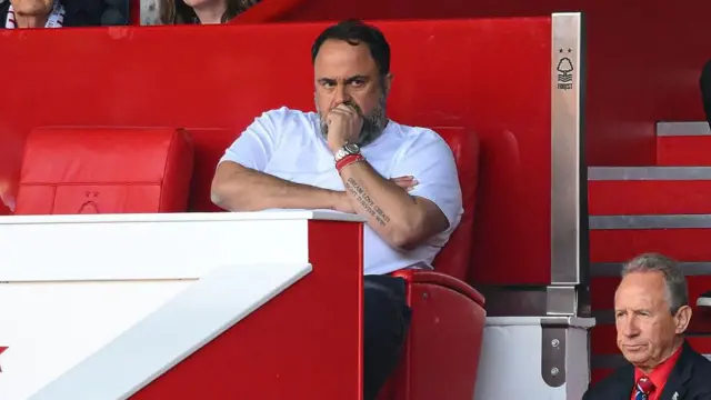 Evangelos Marinakis sits at the City Ground looking thoughtful