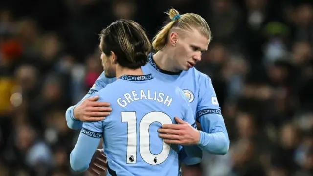 Jack Grealish and Erling Haaland