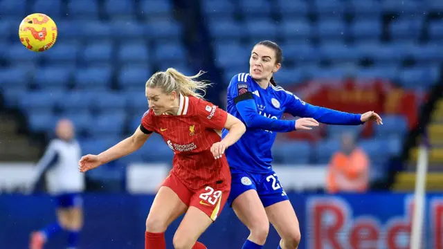 Leicester's Shannon O'Brien battles with Liverpool's Gemma Bonner in their WSL match at the King Power Stadium