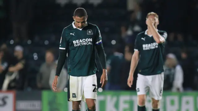 Brendan Galloway with his head down