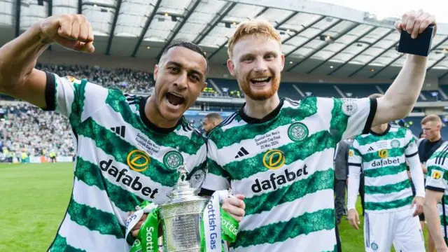 Adam Idah and Liam Scales celebrate after Celtic won the Scottish Cup to complete the double last season