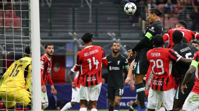 Virgil van Dijk scores a header for Liverpool against AC Milan