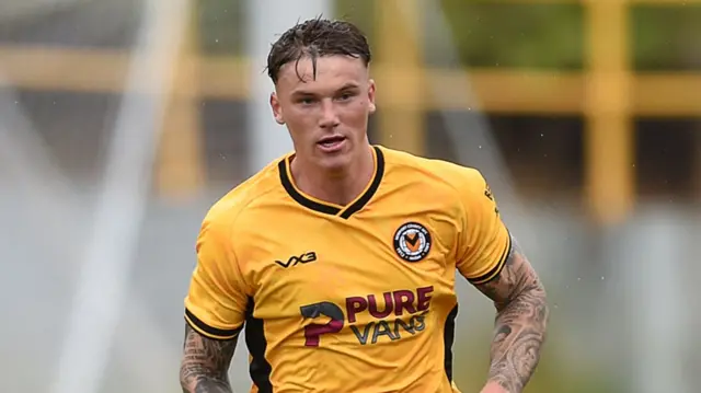 Newport County midfielder Kai Whitmore in action