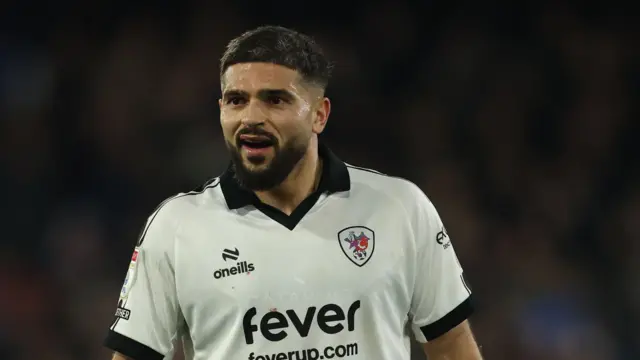 A close up of Sam Morsy in a white Bristol City shirt while playing for the club against Ipswich Town in January