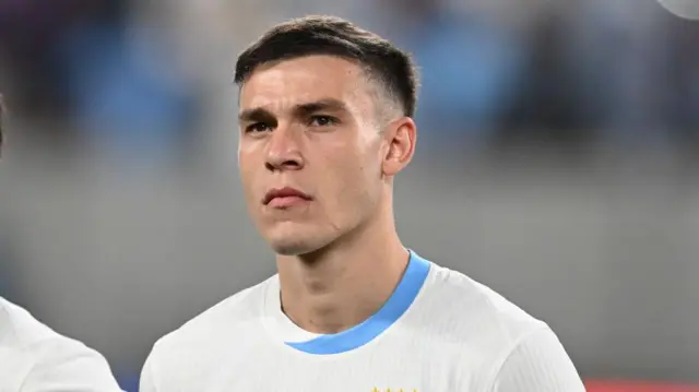 Manuel Ugarte #5 of Uruguay stands for the national anthem before a Copa America 2024 Group C match between Bolivia and Uruguay at MetLife Stadium