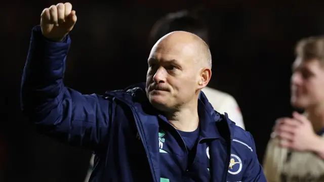Millwall boss Alex Neil celebrates after the win at Bristol City
