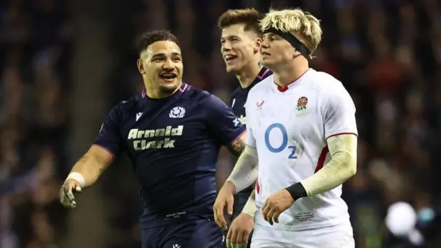 Sione Tuipulotu chats to England's Henry Pollock