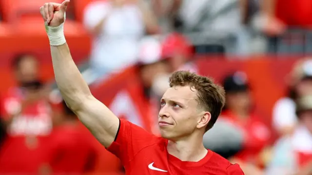 Canada's Alistair Johnston celebrates