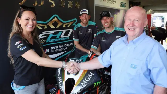 FHO Racing team boss Faye Ho with North West 200 Race Director Mervyn Whyte and the team's riders Peter Hickman and Davey Todd