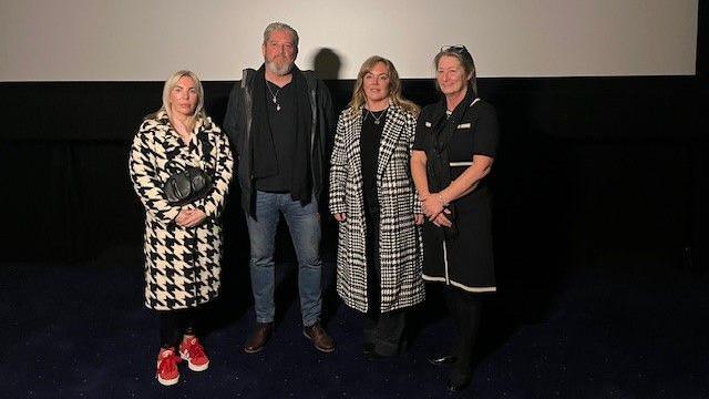 Ashley Dale's mother, Julie, stands next to Elle Edwards' father, Tim, Sam Rimmer's mother, Joanne and Olivia Pratt-Korbel's mother, Cheryl in the cinema at Liverpool One.