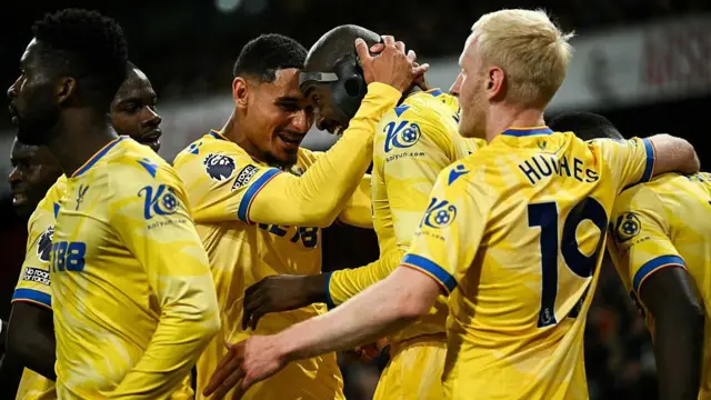 Jean-Philippe Mateta (C) celebrates with his teammates