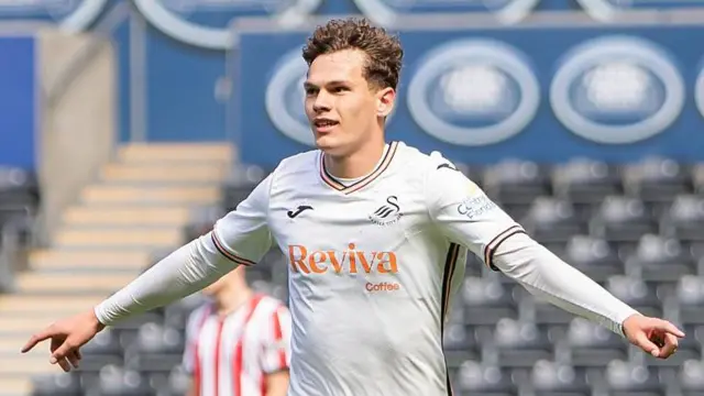 Thomas Woodward celebrates scoring for Swansea Under-21s last May