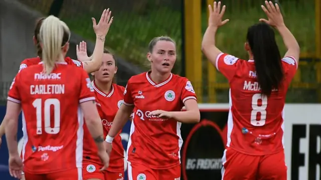 Cliftonville players congratuate hat-trick hero Carla Devine