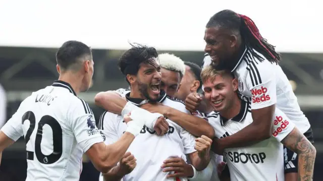 Fulham players celebrate