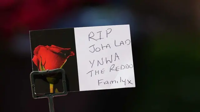 A tribute reads 'RIP JOTA LAD' at Anfield