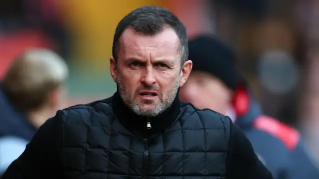 Nathan Jones looking on from the touchline.