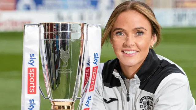 Hibernian's Kirsten Reilly with the Sky Sports Cup trophy during a press conference ahead of the Sky Sports Cup Final