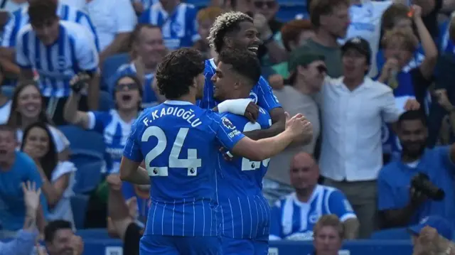 Brighton midfielder Yasin Ayari celebrates with teammates after scoring their third goal