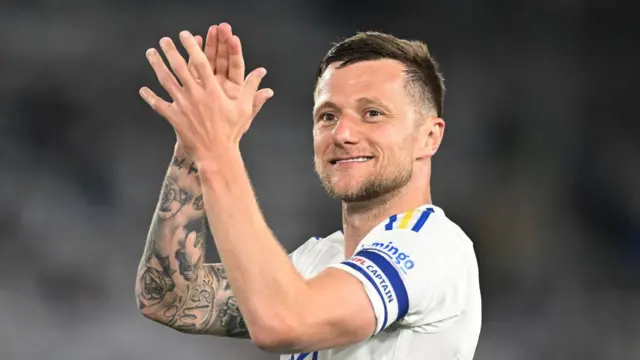 Liam Cooper of Leeds United celebrates following the team's victory in the Sky Bet Championship Play-Off Semi-Final 2nd Leg match between Leeds United and Norwich City at Elland Road