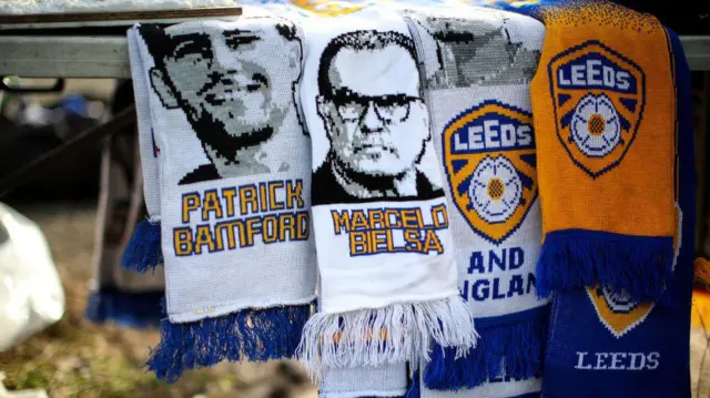 Leeds United scarves depicting Patrick Bamford and Marcelo Bielsa