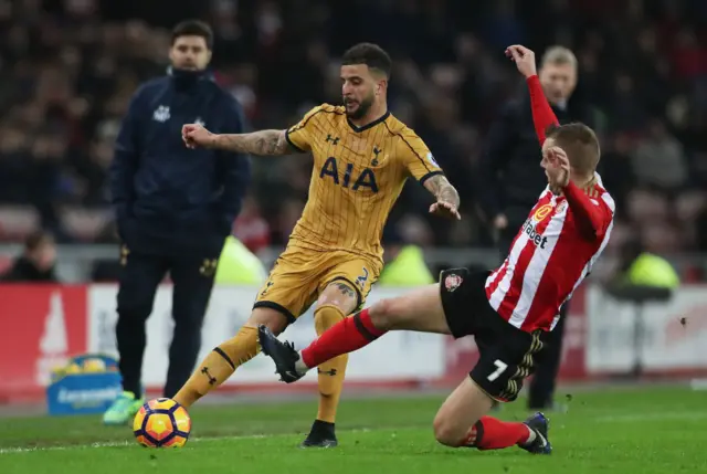 Kyle Walker of Tottenham Hotspur is tackled by Sebastian Larsson of Sunderland during the Premier League match between Sunderland and Tottenham Hotspur at Stadium of Light on January 31, 2017