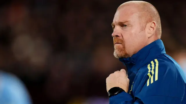 Sean Dyche stands on the touchline