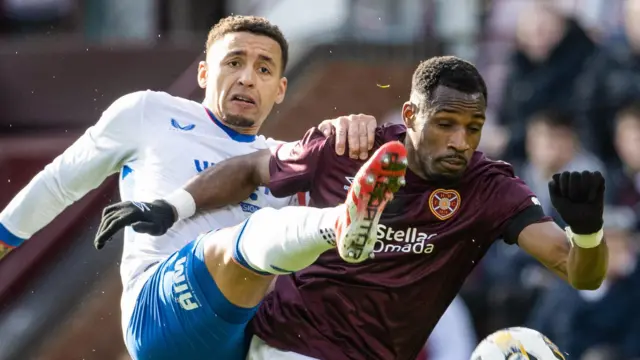 Rangers' James Tavernier and Hearts' Elton Kabangu