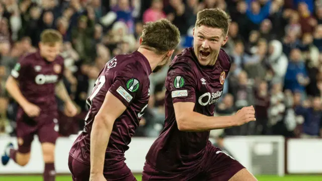 Blair Spittal and Alan Forrest celebrate