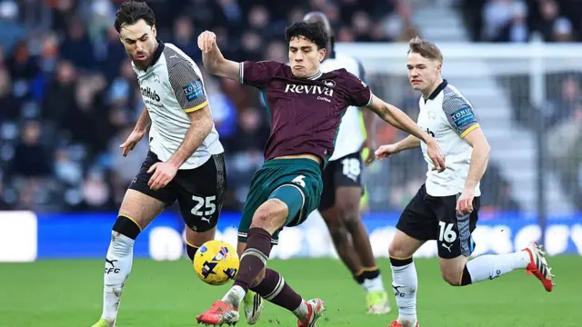 Marko Stamenic wins the ball at Derby 