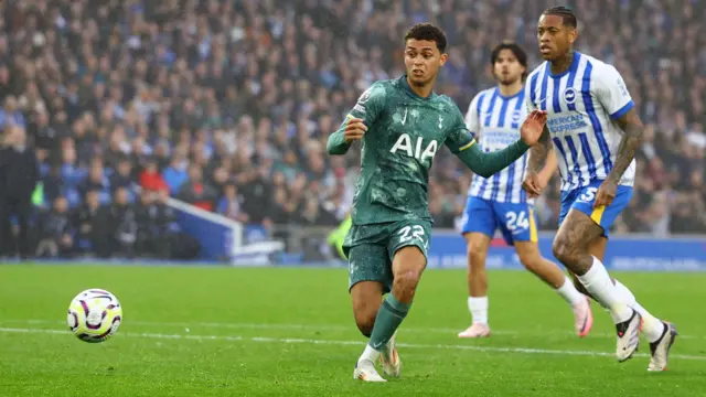 Brennan Johnson scoring a goal for Tottenham