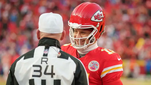 Kansas City Chiefs quarterback Patrick Mahomes talks with an NFL referee