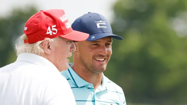 Donald Trump and Bryson DeChambeau during a round of golf