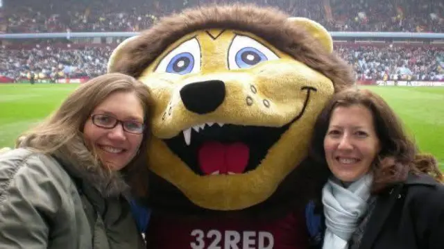 Two women with Aston Villa mascot