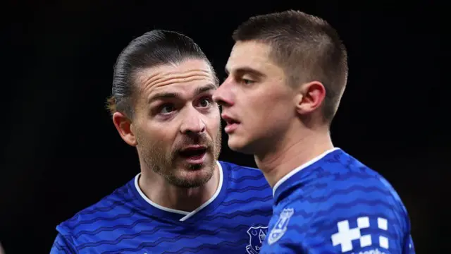 Jack Grealish and Vitalii Mykolenko 